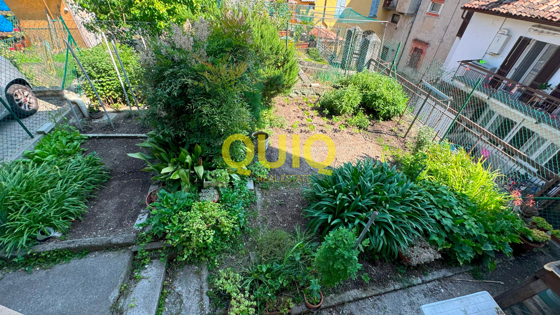 VALMADRERA, BILOCALE AL PIANO TERRA CON CANTINA POSTO AUTO E GIARDINO - CENTRO