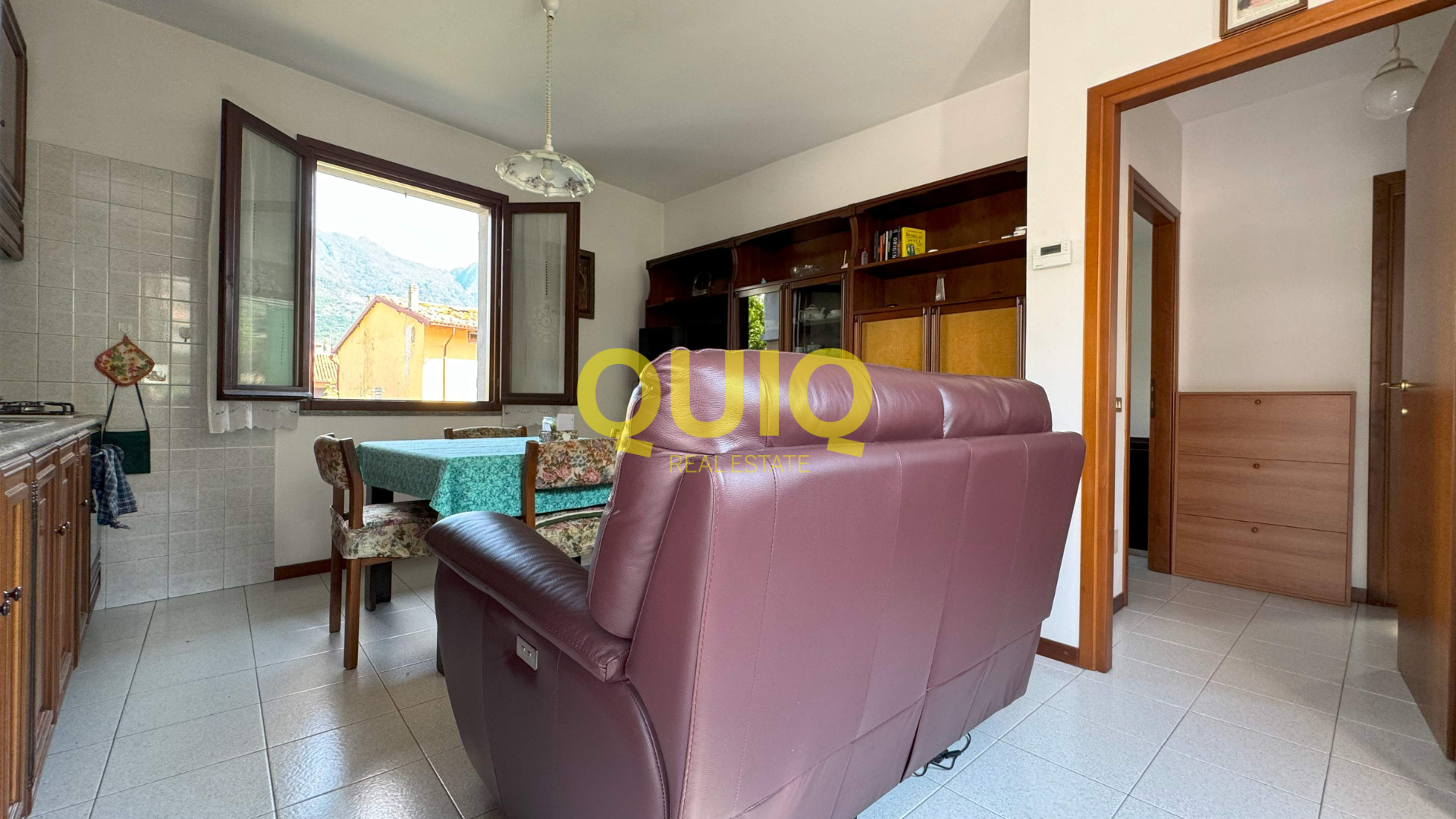 VALMADRERA, BILOCALE AL PIANO TERRA CON CANTINA POSTO AUTO E GIARDINO - CENTRO