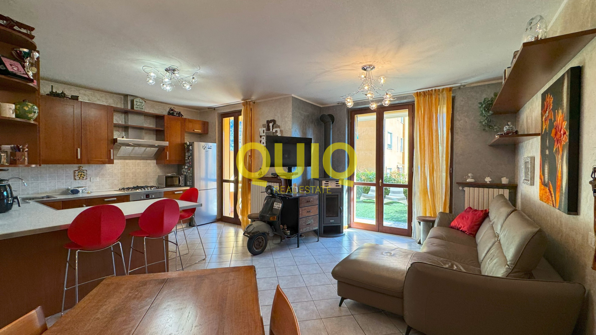 Valmadrera, trilocale al piano terra con box, cantina e doppio giardino