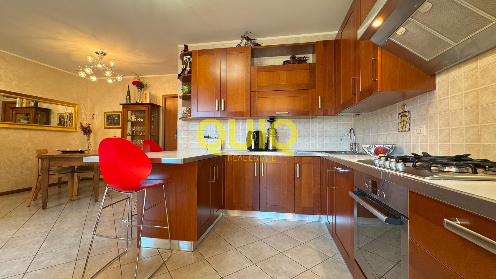 Valmadrera, trilocale al piano terra con box, cantina e doppio giardino