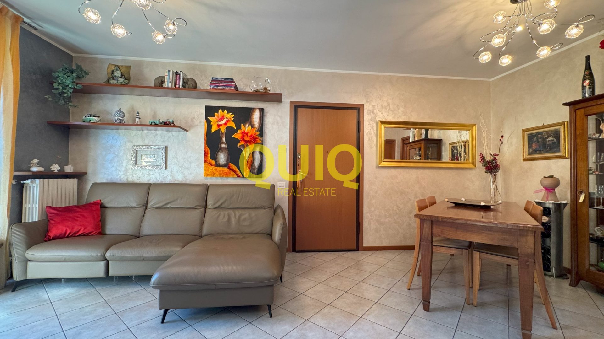 Valmadrera, trilocale al piano terra con box, cantina e doppio giardino