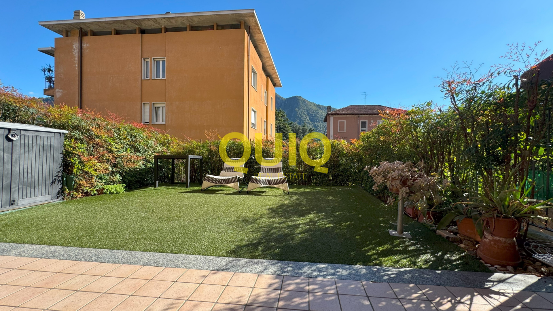 Valmadrera, trilocale al piano terra con box, cantina e doppio giardino