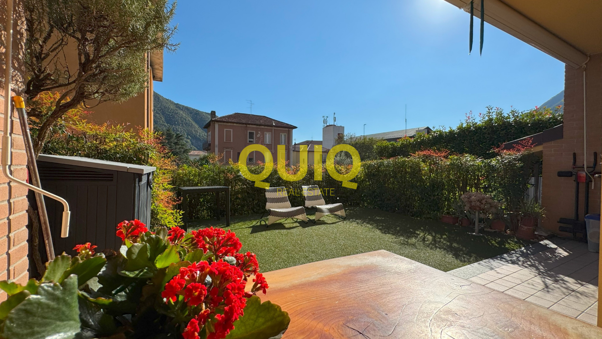 Valmadrera, trilocale al piano terra con box, cantina e doppio giardino